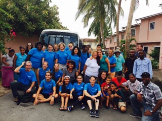 The Antiguan locals and the American volunteers pose together for a group photo.