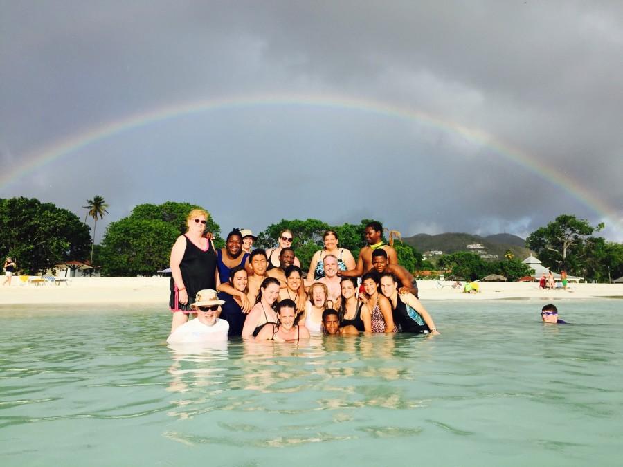 Olivia and her team members relax in the local tropical waters of Antigua and Barbuda