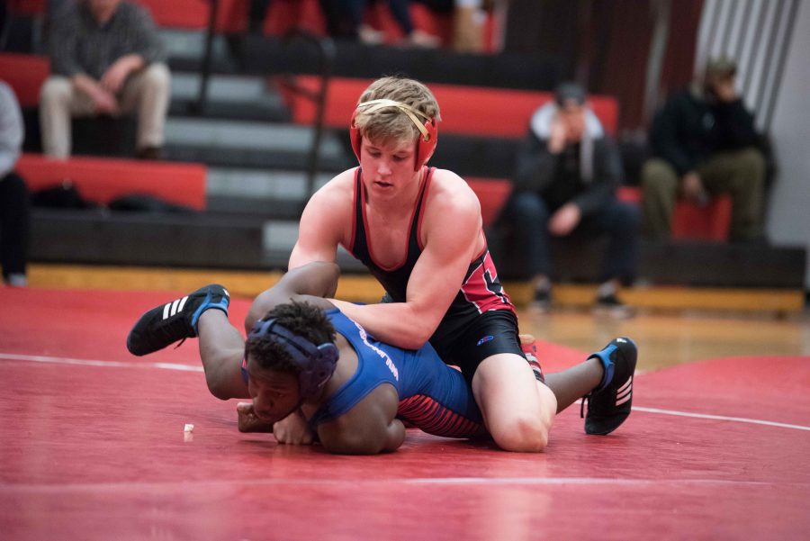 Senior Ryan Teague controls his opponent in a match during the 2015-2016 season.                                                          