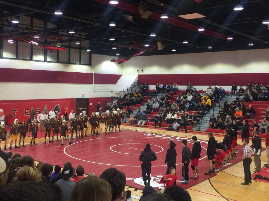 Delran and Cinnaminson assemble for lineups prior to the beginning of the February 1 match.