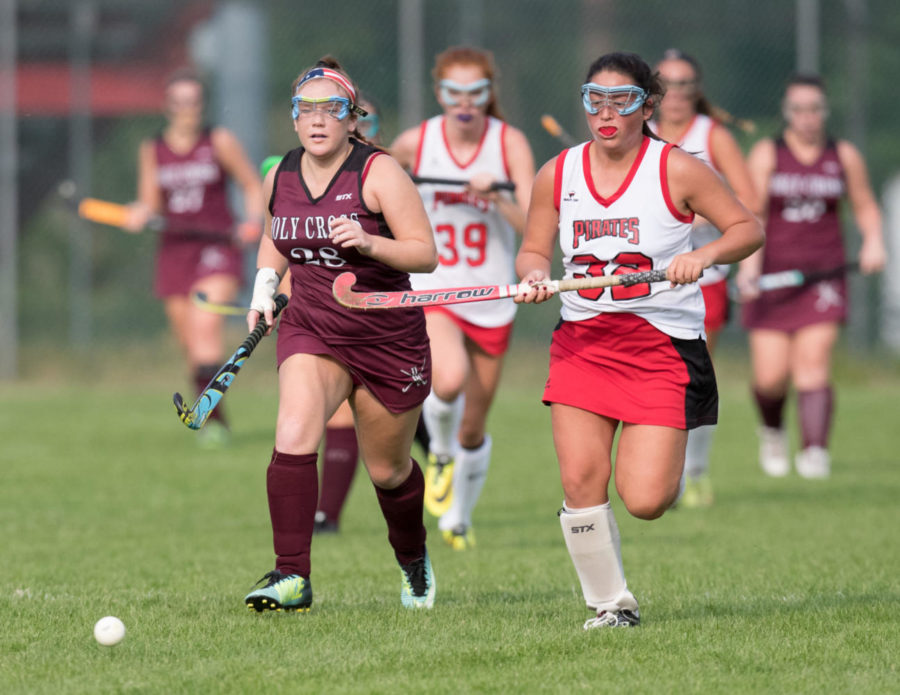 Senior Roxanne Wesley chases after the ball during the teams 5-0 thrashing of Holy Cross on Sept. 11