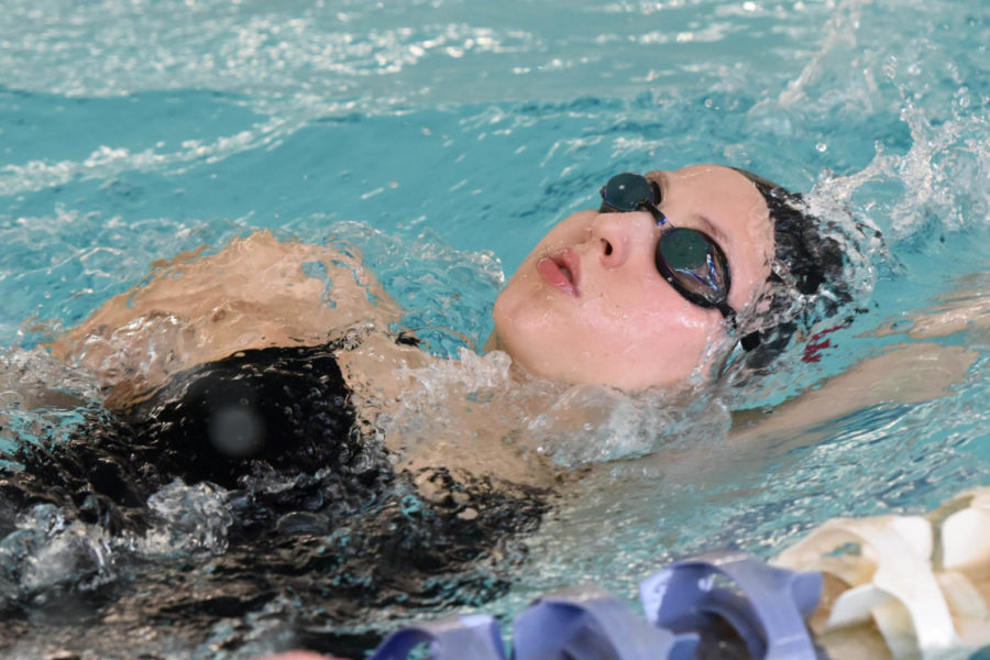 Senior Alyssa Cherubino works her backstroke before a meet this season for CHS