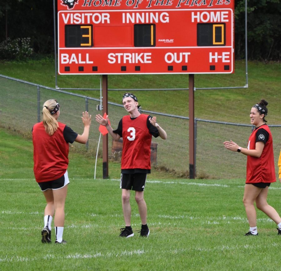 Maddie Figiel (l), Sean Overman (center) and Alex Reid (r) celebrate during last years Play Unified Soccer Event