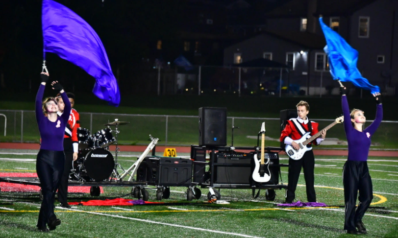 The marching band's color guard performs at halftime at the CHS football game (photos courtesy of the CHS marching band)