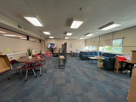 One section has a couch and is designed to be an area where students can relax. Section two is outfitted with paper, pencils, and art supplies for students to complete school work and let their creativity flow. A third section  has bean bag chairs and a TV screen to promote restfulness while the final section has a table to eat at or just relax.