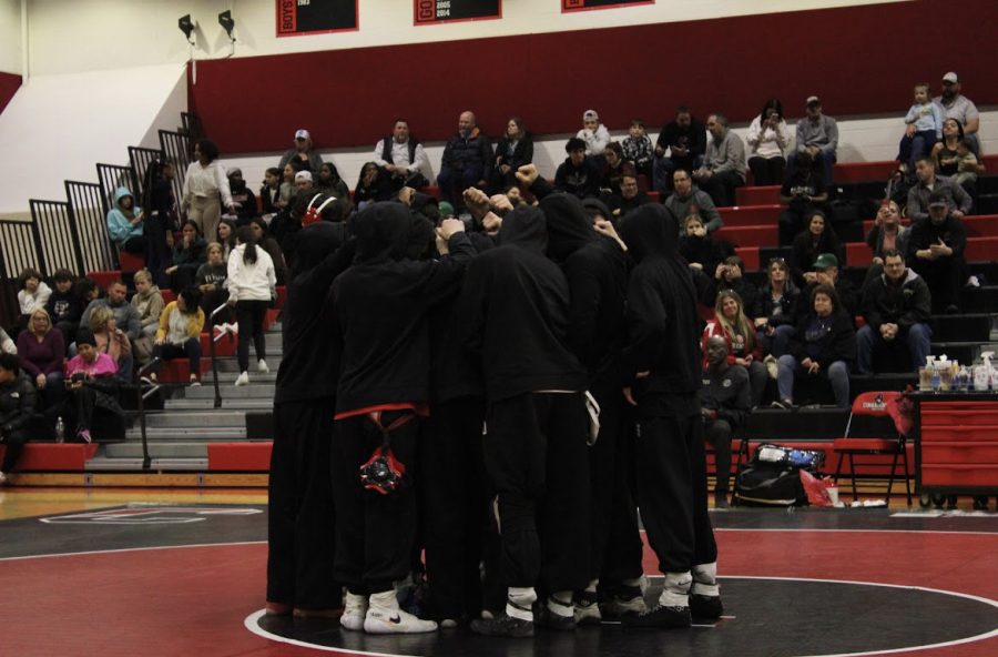 Wrestling Team Huddle
Photo Courtesy of RJ Siwiec