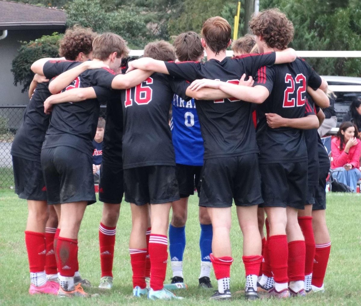 (Photo courtesy of Kelly Huber)
The Pirates in a huddle during their game.