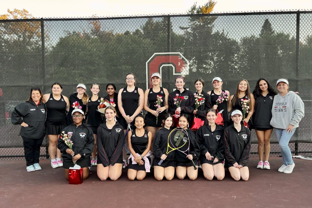 (Photo courtesy of Girls' Tennis Team) CHS Girls' Tennis Team gathered together on the court during Senior Day.