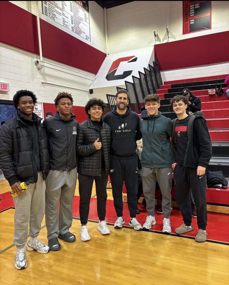 (Photo Courtesy of Jon Vargas) Jayon Wescott, Sody Gantt, Jon Vargas, Dylan McAndrews, and Tommy Lorimer meet Eagles Head Nick Siranni at a basketball game ahead of the Eagles' divisional playoff game against the Los Angeles Rams. 