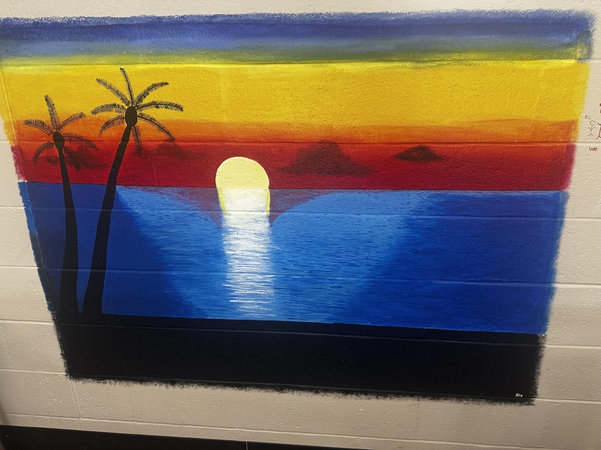 (Courtesy of Gianna Wright) This mural, painted by a former AP student, helps bring a calm and peaceful atmosphere to Hyland's classroom, reminiscent of the beach.