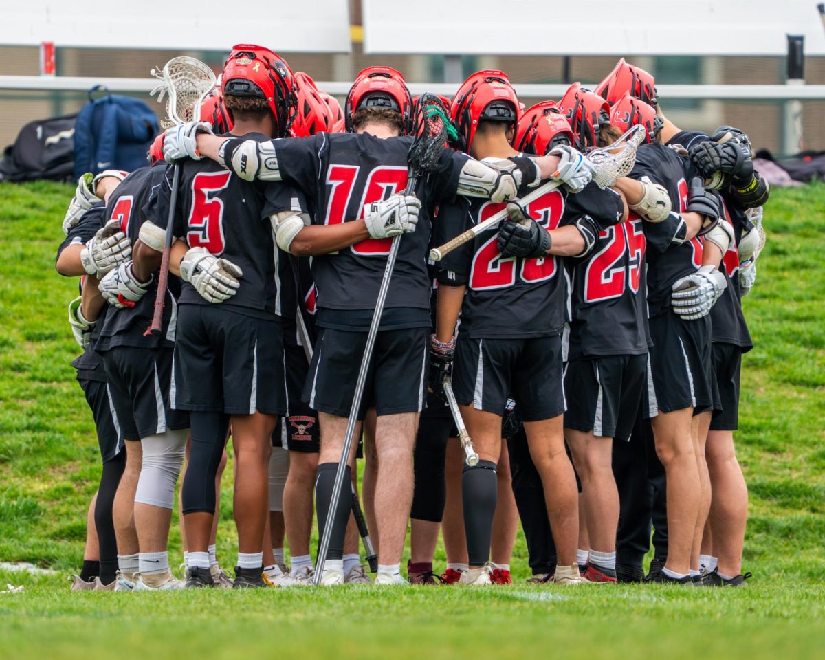 The Pirates had a team prayer before their games lead by Senior Tyler Palladino (photo courtesy of Official Flicks)