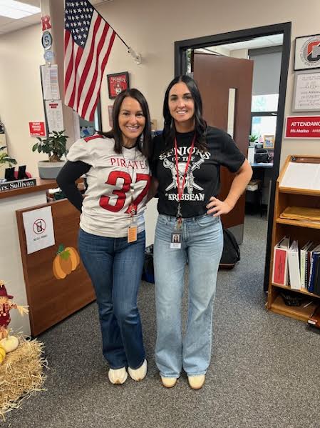 (Photo courtesy of Patricia Marino) Marino now works alongside her sister in the main office, creating a stronger bond. Pictured above is Mrs. Marino and Mrs. McNally posing for a picture on the day of pep rally.