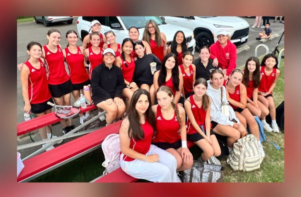 (Photo Courtesy of Jennifer Alvarado) Players pose for a team photo, getting ready for the challenges of the playoffs