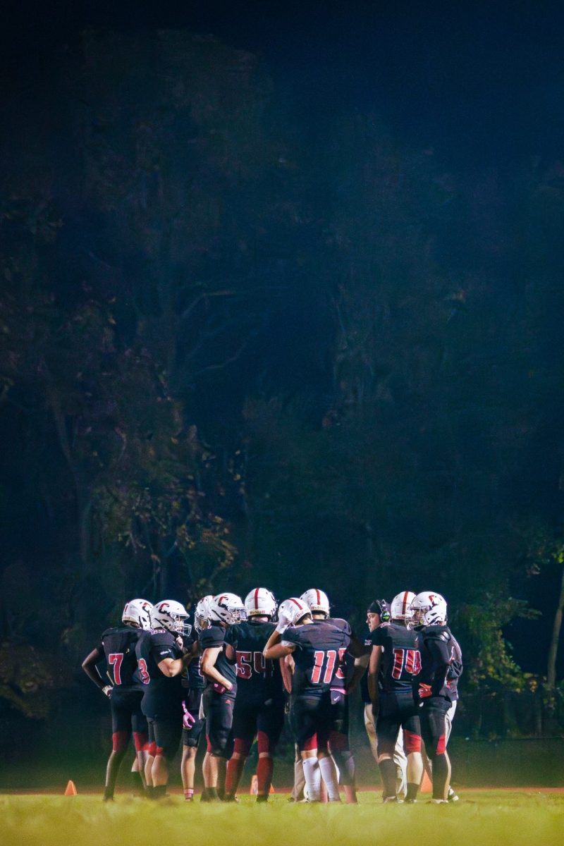 (Courtesy of Sophomore Nate Obuchowski)
The team huddles to discuss the next play.