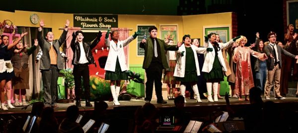 (Photo courtesy of Zachary Bohn) 
The closing cast of Little Shop of Horrors gives a final warning to the audience through song not to feed the plants.